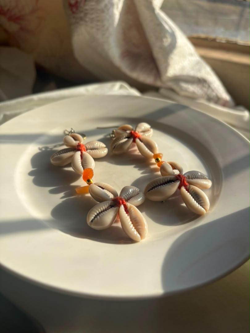 hippie4u — handcrafted shell drop earrings on display
